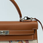 Hermes Covers and Daywear Returns Kelly 32cm of Fauve Barenia Leather Coffee