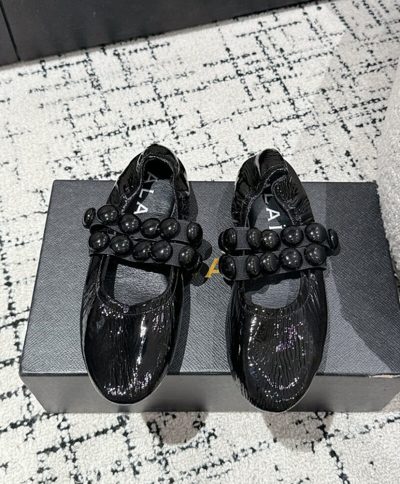 Alaia Women's Sphere Ballet Flats In Patent Leather Black